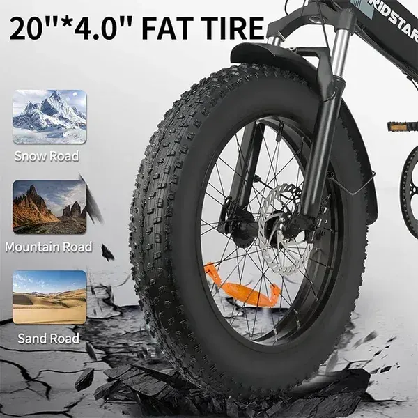 Ridstar H20 en pleine action sur un sentier de montagne, roues larges et cadre robuste.